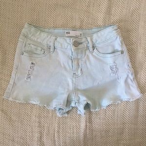 These are cute light blue shorts from RSQ. Lightly worn, a small size 12.
